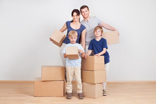 People preparing boxes and furniture for Lewisham removals