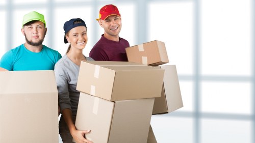 Lewisham furniture removals team handling packed household items safely