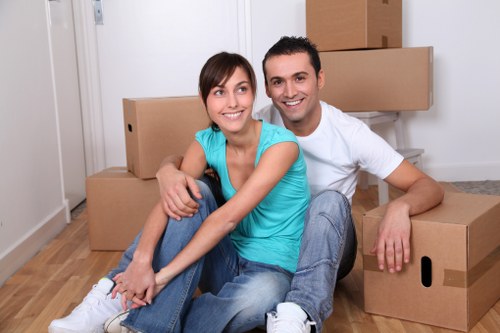 Carefully boxed items for a student move in Lewisham