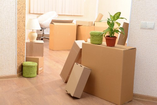 Careful wrapping of fragile items during apartment removals